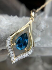 yellow gold blue topaz pendant 230-01188 $440