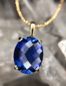 14k yellow gold created sapphire pendant 230-01190 $345