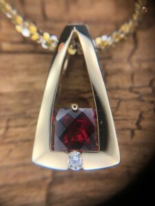 14k yellow gold garnet and diamond pendant 230-01216 $690