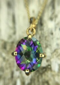 14k yellow gold mystic topaz pendant $365