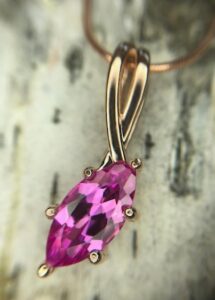 Rose gold pendant with created pink sapphire 230-01226 $425