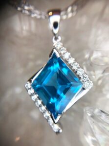 14k white gold blue topaz and diamond pendant 230-01244 $1290