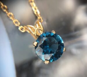 14ky blue topaz pendant 230-01143 $240