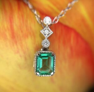 14k white gold emerald and diamond pendant 230-01159 $705