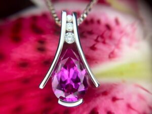 14k white gold created pink sapphire and diamond pendant 230-01242 $945