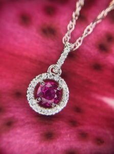 white gold ruby and diamond pendant